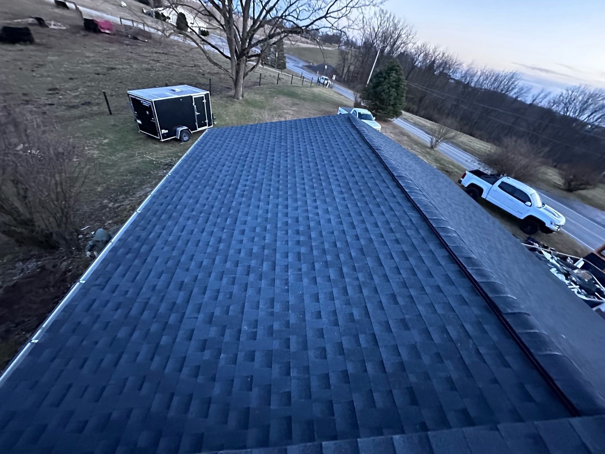 Trusted roofing contractor near me in Allison Park, PA working on residential home