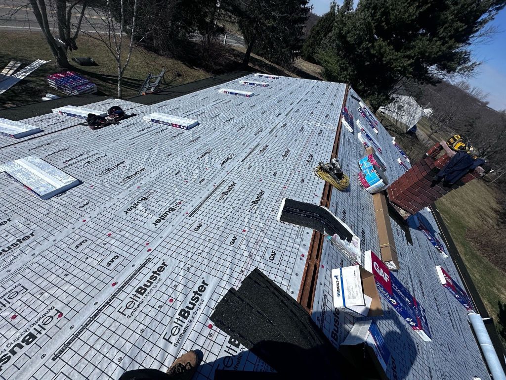 Local roofing contractor in Gibsonia, PA working on a two-story home