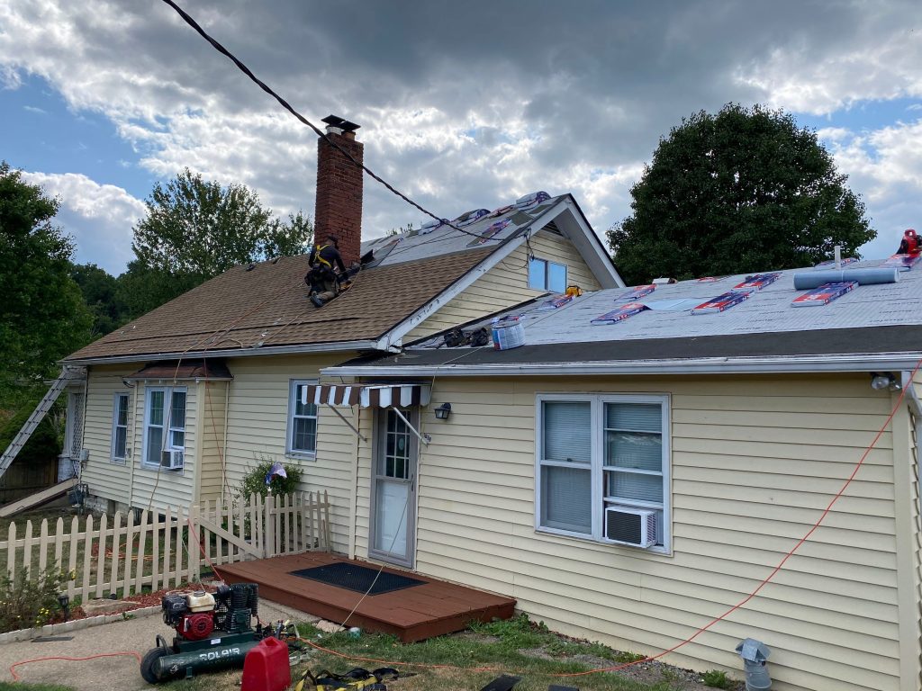 Local roofing contractor near me in Monaca, PA repairing residential leak
